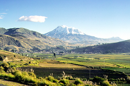 The farthest point from the center of the earth is the 6,310 m extinct Volcán Chimborazo. Ecuador.