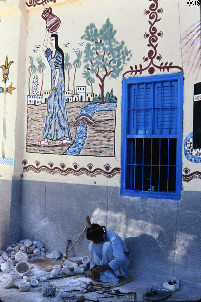 Wall painting in a village near Thebes with blue-painted windows to keep out evil spirits. Egypt.
