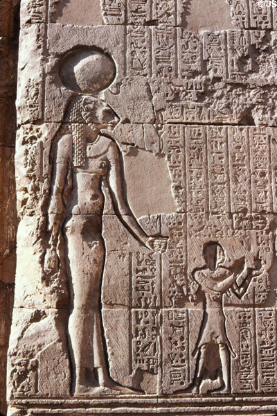 Menheyet the lion-headed goddess & hieroglyphs in Temple of Khnum in Esna. Egypt.