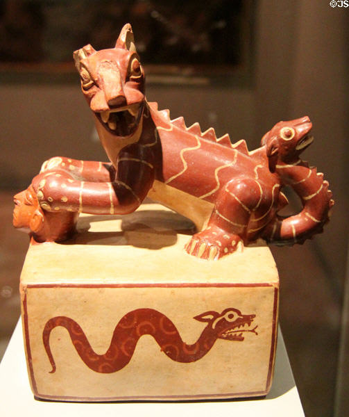 Moche ceramic vessel in shape of feline with snake tail (100-700) from Peru at Museum of America. Madrid, Spain.