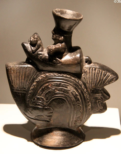 Lambayeque culture sculpted ceramic vessel with figure atop fish theme (700-1350) from North Coast, Peru at Museum of America. Madrid, Spain.