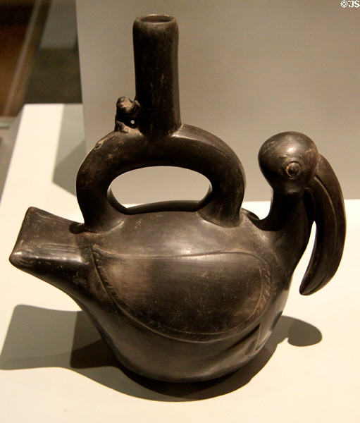 Chimu culture ceramic stirrup-spout bottle with bird (1100-1400) from Peru at Museum of America. Madrid, Spain.