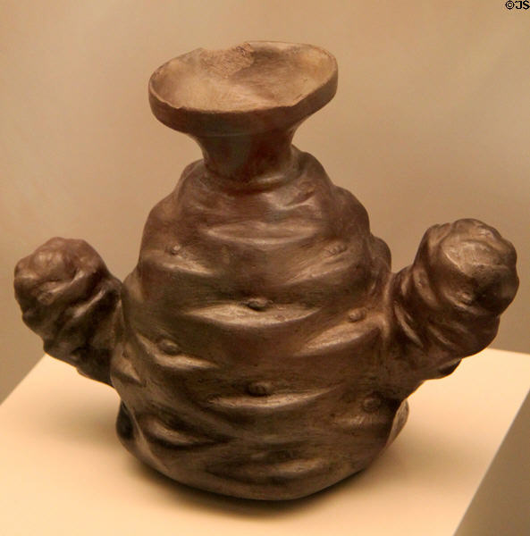 Chimu culture ceramic bottle in form of potato which originated in the Andes (1100-1400) from Peru at Museum of America. Madrid, Spain.