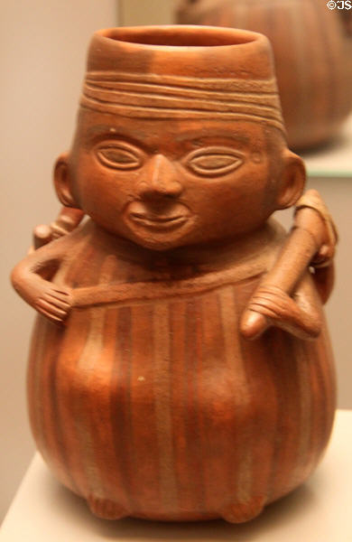 Inca ceramic vessel with farmer carrying tools (1400-1533) from Peru at Museum of America. Madrid, Spain.