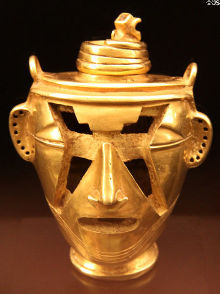 Quimbaya culture stylized gold head of chieftain (200-1000 CE) from Colombia at Museum of America. Madrid, Spain.