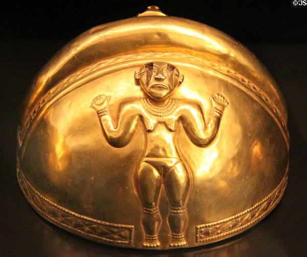 Quimbaya culture gold helmet with female relief (200-1000 CE) from Colombia at Museum of America. Madrid, Spain.