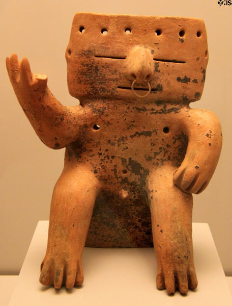 Quimbaya culture ceramic human figure with gold nose ring (1000-1500 CE) from Colombia at Museum of America. Madrid, Spain.