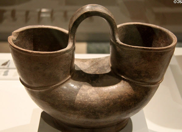 Tairona culture ceramic double-mouth vessel with stirrup handle (800-1500 CE) from Colombia at Museum of America. Madrid, Spain.