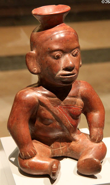 Colima culture ceramic sitting figure (100-700 CE) from Western Mexico at Museum of America. Madrid, Spain.