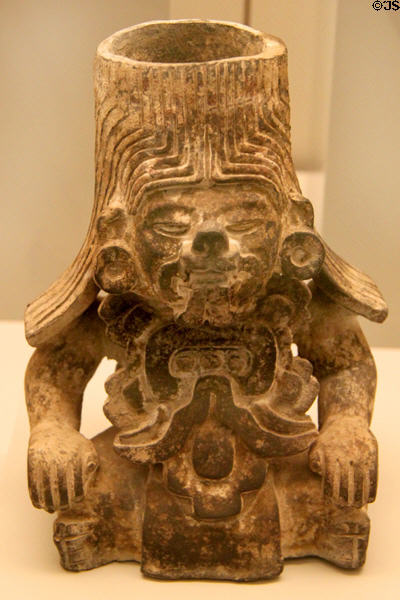 Zapoteca culture ceramic sitting male vessel with feline traits (100-700 CE) from Monte Alban Mexico at Museum of America. Madrid, Spain.