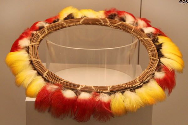 Jibaro culture pendant with parrot feathers (19thC) from Peruvian Amazon at Museum of America. Madrid, Spain.