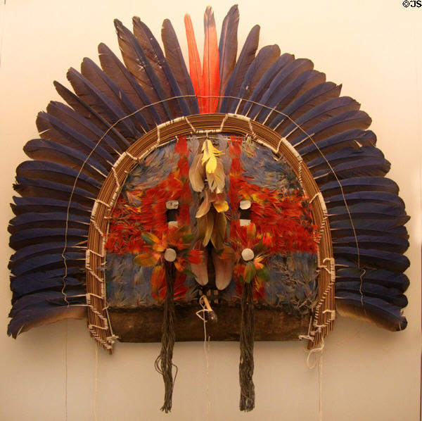 Tapirapé culture feathered shaman's mask (20thC) from Brazilian Amazon rio Xingú at Museum of America. Madrid, Spain.