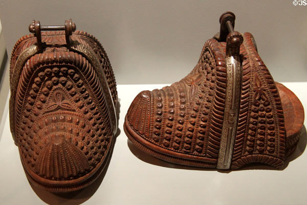 Carved wooden stirrups (18th-19thC) from Chile at Museum of America. Madrid, Spain.