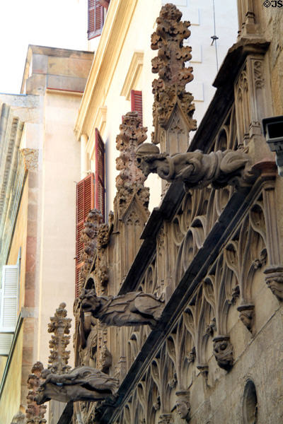 Gargoyles projecting over Carrer del Bisbe. Barcelona, Spain.