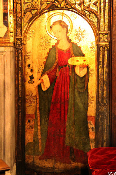 St Lucia panel from St Clair & St Catherine altarpiece (1688) by Miquel Nadal & Pere Garcia de Benavarri at Barcelona Cathedral. Barcelona, Spain.