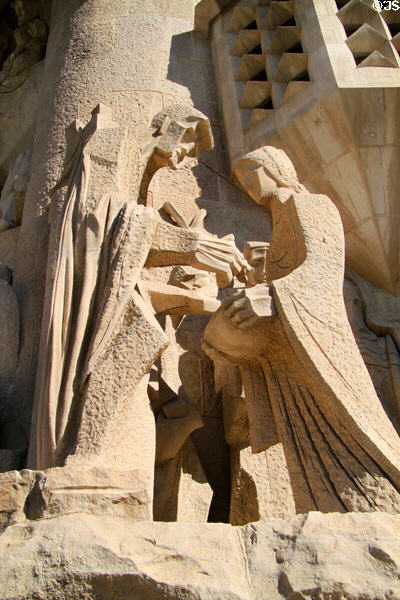 Pontius Pilate washing his hands on Passion Facade at Sagrada Familia. Barcelona, Spain.