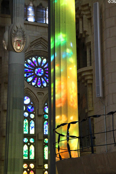 Stained glass cast color on columns at Sagrada Familia. Barcelona, Spain.