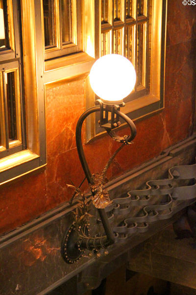 Lamps & ironwork decorations in central hall at Palau Güell. Barcelona, Spain.
