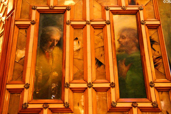 Saints painted on door of private chapel in central hall at Palau Güell. Barcelona, Spain.
