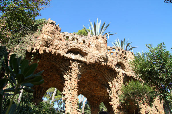 Viaduct in Parc Güell, part of Park's walkway system. Barcelona, Spain. Architect: Antoni Gaudí.
