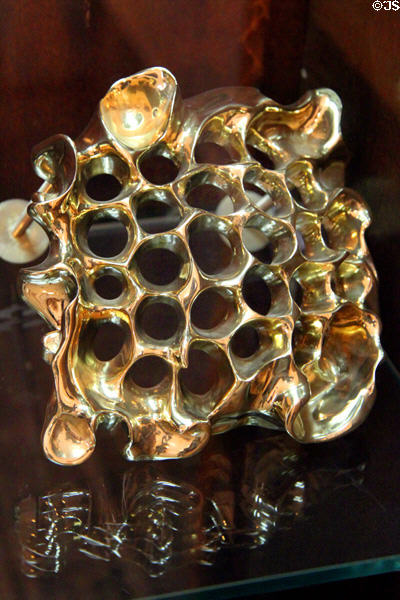 Honeycomb grill designed by Antoni Gaudí at Gaudi House Museum in Parc Güell. Barcelona, Spain.