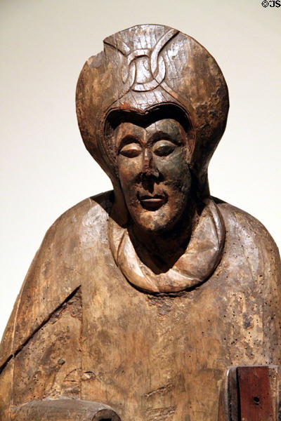 Wood carving of figure from church of Nativity of Mary of Durro (12thC) at Museu Nacional d'Art de Catalunya. Barcelona, Spain.