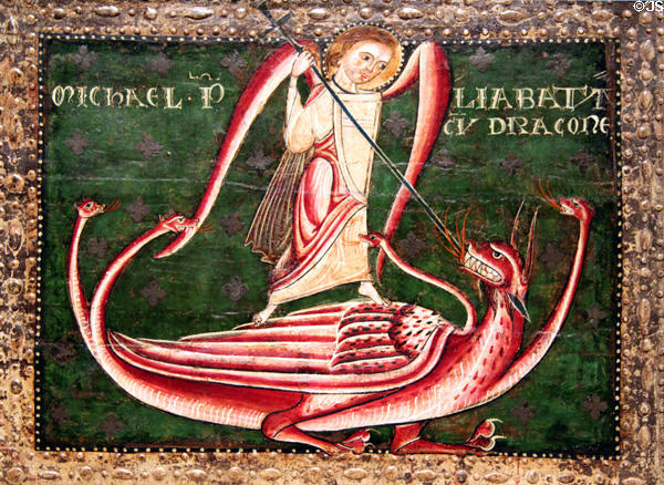 Altar painting (13thC) detail of Archangel Michael slaying dragon from church of Catalunya at Museu Nacional d'Art de Catalunya. Barcelona, Spain.