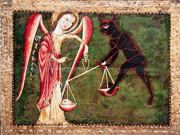Altar painting (13thC) detail of the Archangel Michael battling devil for souls from church of Catalunya at Museu Nacional d'Art de Catalunya. Barcelona, Spain.