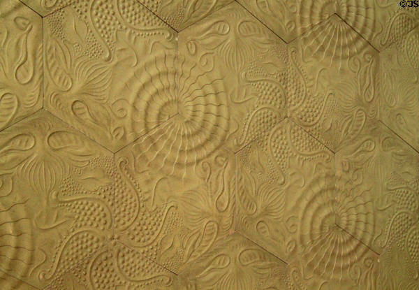 Modernista pressed tile pavement with spirals (1904-6) from Barcelona by Antoni Gaudí at Museu Nacional d'Art de Catalunya. Barcelona, Spain.