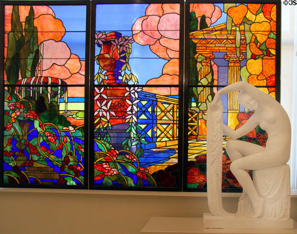 Stained glass window (1911) by Francesc Labarta & statue of woman (1926) by Jaume Otero at Museu Nacional d'Art de Catalunya. Barcelona, Spain.