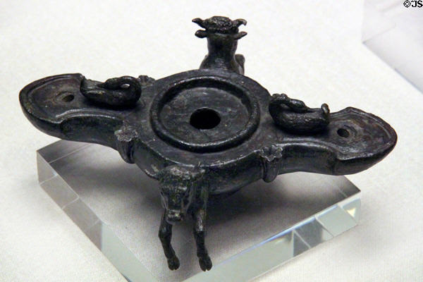 Iberian iron oil lamp supported by cows at Museu d'Arqueologia de Catalunya. Barcelona, Spain.