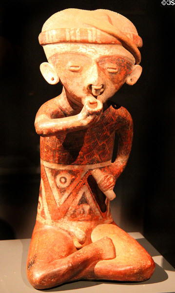 Male terracotta figurine (100-250) from Nayarit, Mexico at Barbier Mueller Precolumbian Art Museum. Barcelona, Spain.