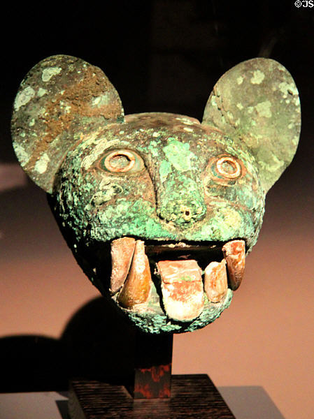 Gold & copper feline head (100 BCE-600 CE) from Mochica Culture, Peru at Barbier Mueller Precolumbian Art Museum. Barcelona, Spain.