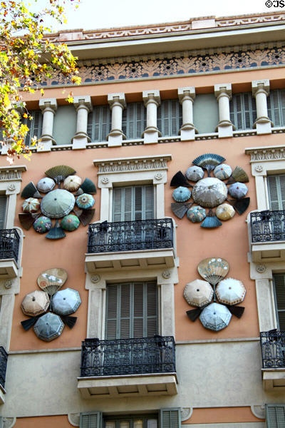 Umbrellas & fans on facade of Casa Bruno Cuadros on La Rambla. Barcelona, Spain.