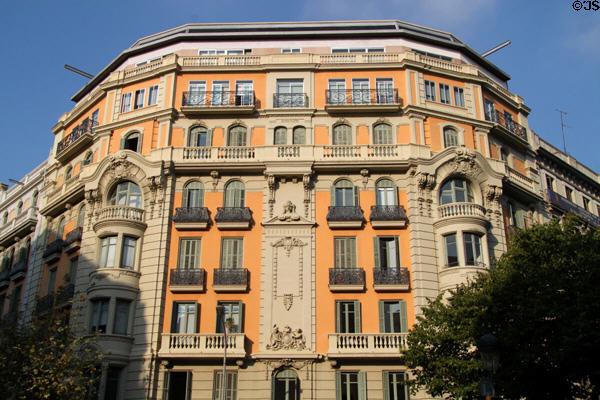 Typical corner building in Eixample district at Rambla de Catalunya 105 at Carrer de Provença. Barcelona, Spain.
