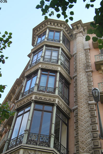 Facade details of corner building at Rambla de Catalunya 86. Barcelona, Spain.