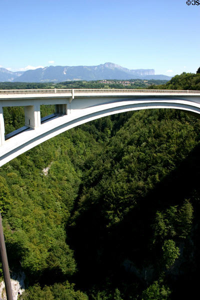 Modern road bridge (1924-28) parallel to Pont de la Caille now carries national route 201. Annecy, France. Architect: Caquot.