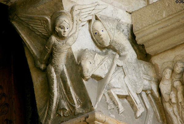 Detail of pilgrim on horse to right of tympanum of Cathedral St. Lazarre. Autun, France.