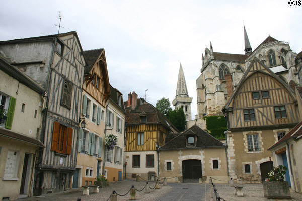 Half-timbered buildings on Place du Coche D'Eau plus Abbey of St Germaine. Auxerre, France.
