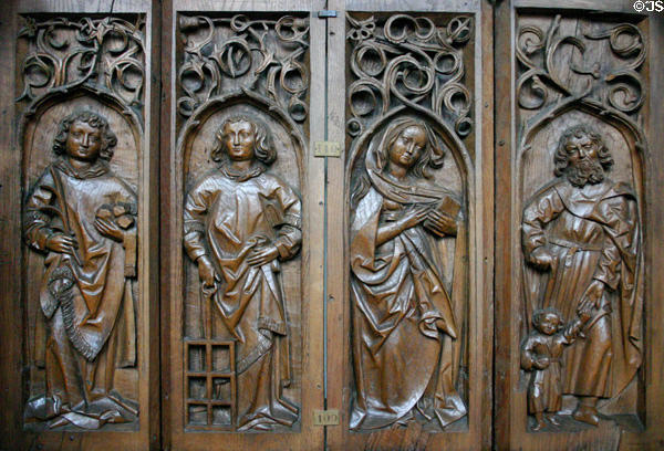 Oak choir stalls (1493) carved with saints in Unterlinden Museum. Colmar, France.