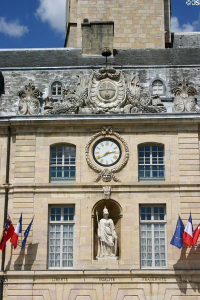 Details of clock, Athena & Baroque decoration of court of Honor (17th c) of Palace of Dukes of Burgundy. Dijon, France.