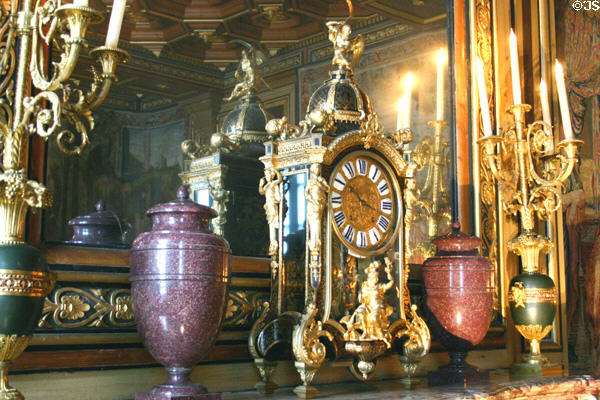 Clock in tapestry salon of Fontainbleau Palace. Fontainbleau, France.