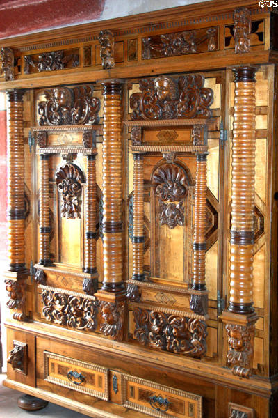 Carved cabinet with several woods in Haut Koenigsbourg. France.