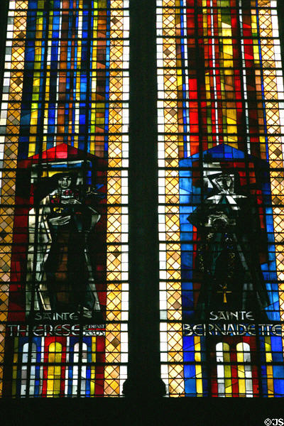 Modern stained-glass of saints Therese & Bernadette in Cathedral. Metz, France.