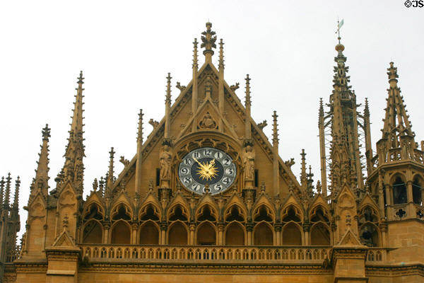 Clock under facade peak of Cathedral of St Etienne. Metz, France.