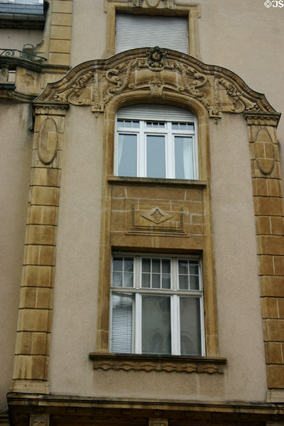1910s formal carvings on building in German Imperial quarter. Metz, France.
