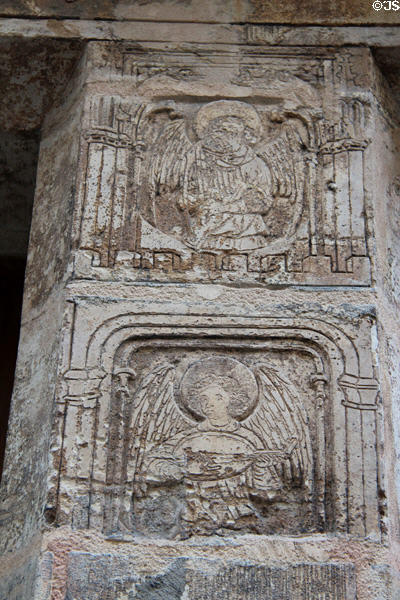 Carved reliefs of angels beside doorway at Nicolas Flamel house (1407). Paris, France.