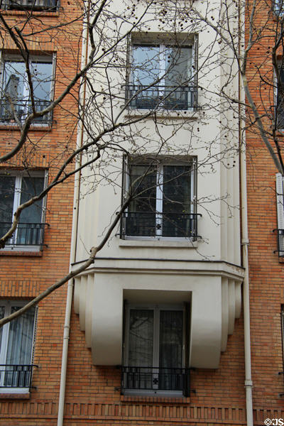 Detail of Art Deco apartment building (27 rue de Picardie) beside Le Carreau du Temple. Paris, France.