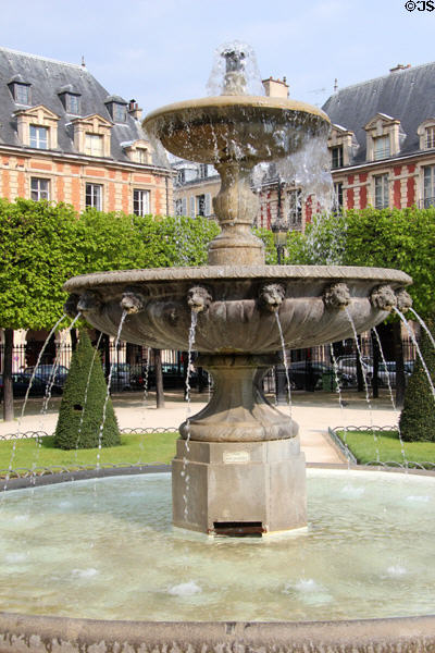 Place des Vosges fountain (1825) by Cortot. Paris, France.
