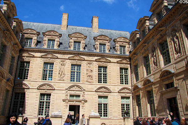Courtyard facades at Hotel de Sully (1625). Paris, France. Style: Louis XIII. Architect: Jean Androuet du Cerceau.